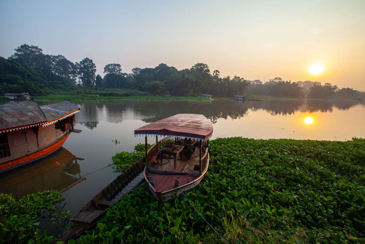 800 Sakae Krang River and boats in the morning shutterstock 1544184578