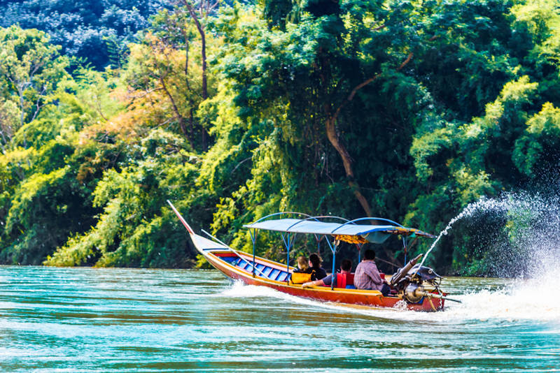 800 boat on Mae Nam Kok river by Chiang Rai shutterstock 1062453665