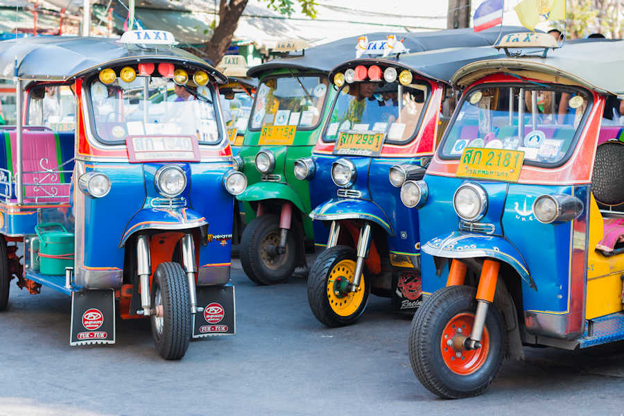 900 Editorial Thai Tuk Tuk taxi on Maharaj Road Rattanakosin Island of Bangkok shutterstock 390665227